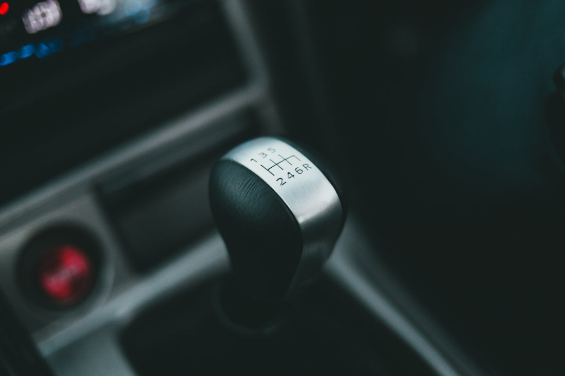 a close up of a gear stick in a car