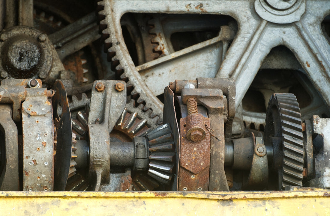 Close-up of rusty industrial gears and machinery