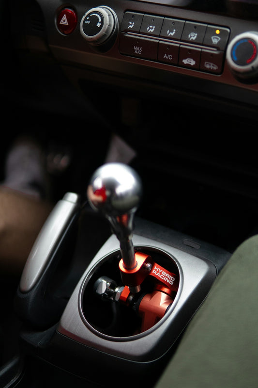 Close-up of a car's manual gear shift knob